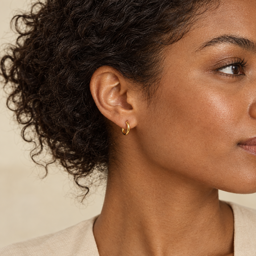 AI-generated model wearing small Smooth Minimal Huggies, three-quarter profile